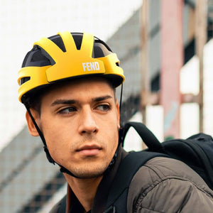 Guy wearing FEND Folding Bike Helmet -Yellow