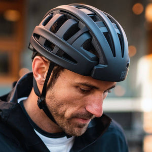 Guy wearing FEND Folding Bike Helmet - Black